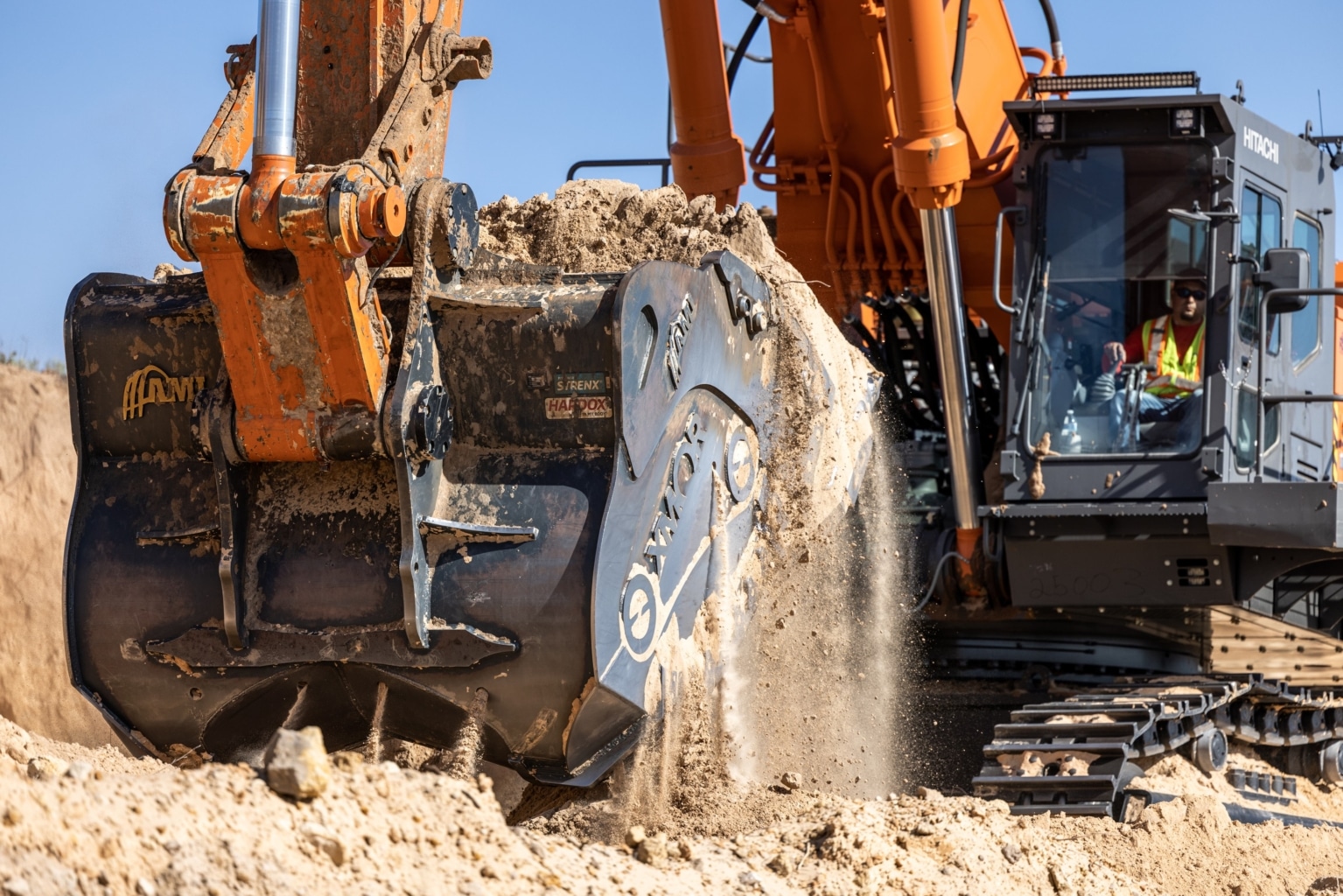 An excavator moving dirt